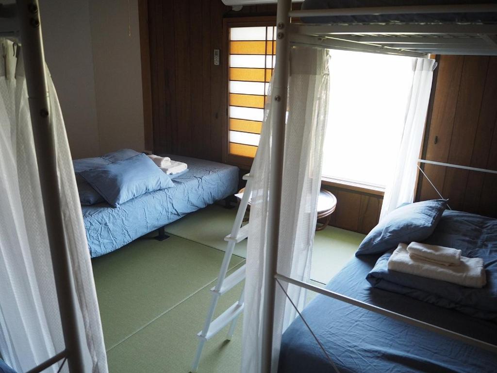 Guesthouse ＆ Beach Cafe Fuego Hyuga Zimmer foto